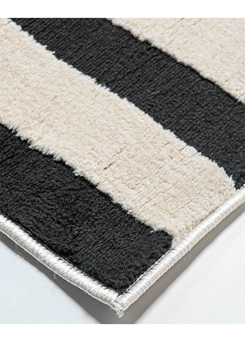 Tapete Geométrico Blanco y Negro con Ángulos Concéntricos
