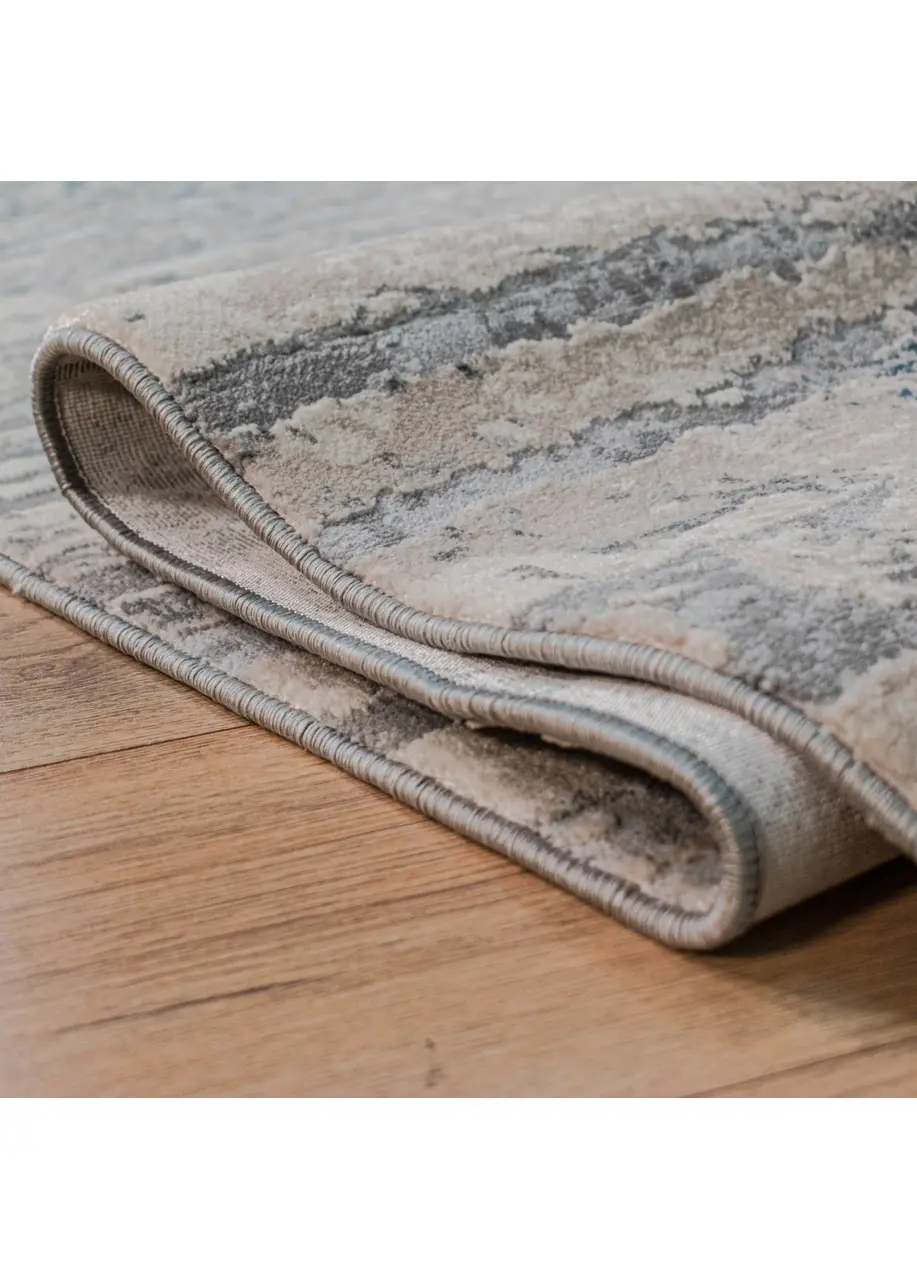 Tapete Moderno Beige con Barridos Horizontales en Gris y Azul