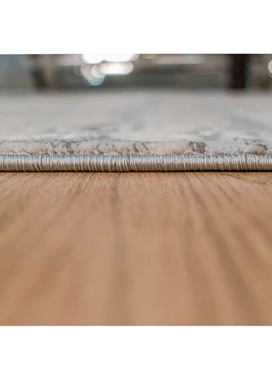 Tapete Moderno Beige con Barridos Horizontales en Gris y Azul